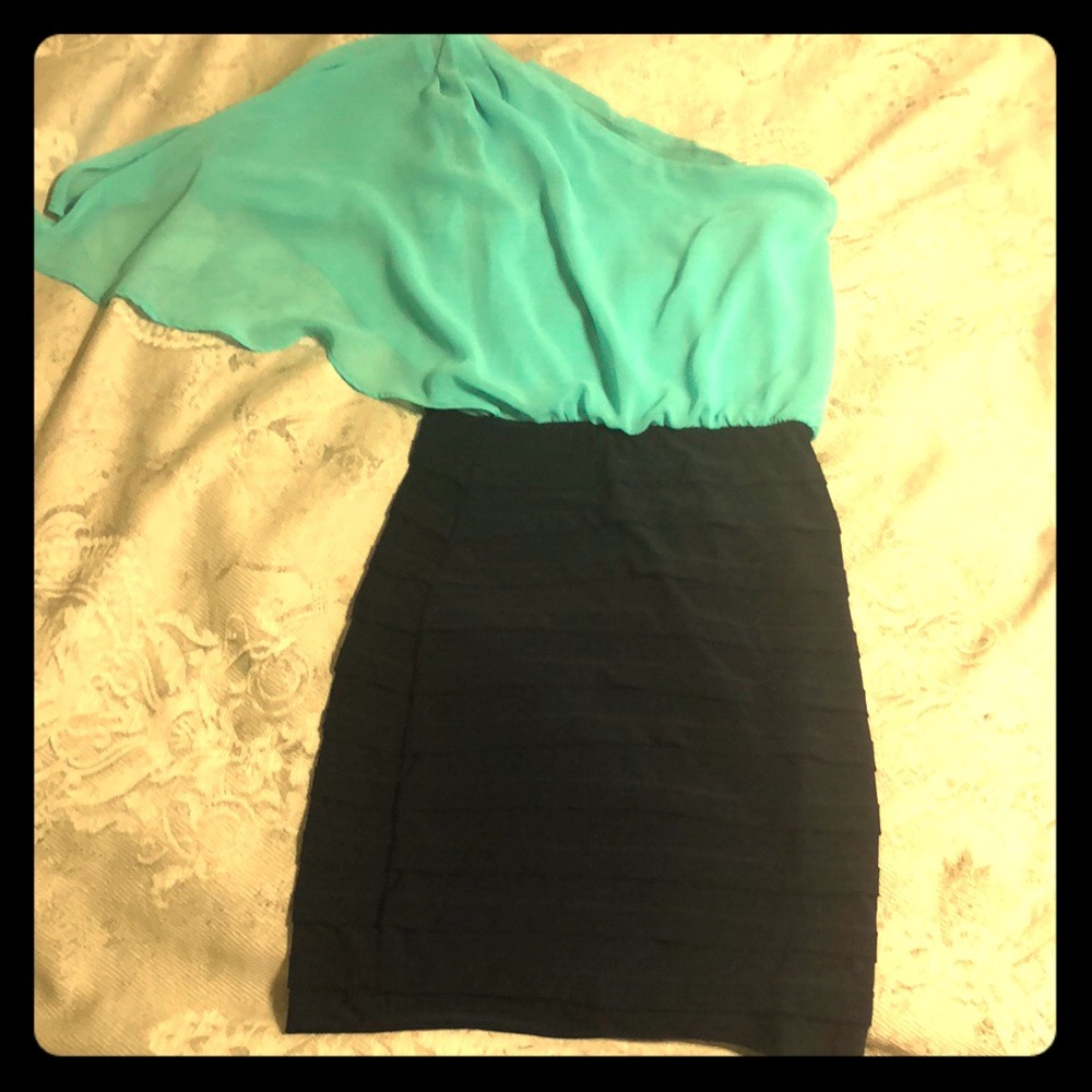 A Turquoise and Navy blue of the shoulder dress